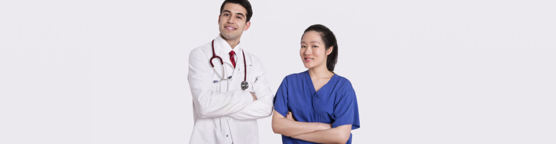 female nurse and a male doctor smiling